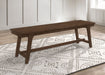 reynolds-rectangular-trestle-base-dining-bench-brown-oak