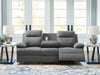 side-swipe-reclining-sofa-with-drop-down-table