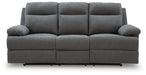 side-swipe-reclining-sofa-with-drop-down-table