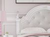 kozlani-upholstered-bed